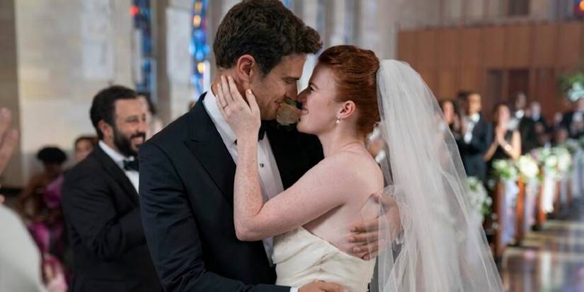 Theo James and Rose Leslie as Henry and Clare, kissing on their wedding day in The Time Traveler's Wife.