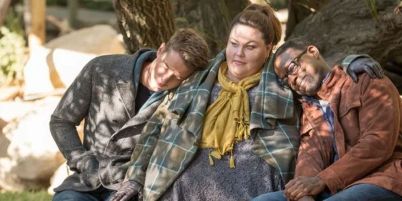 Kevin and Randall with their heads on Kate's shoulders in This Is Us.
