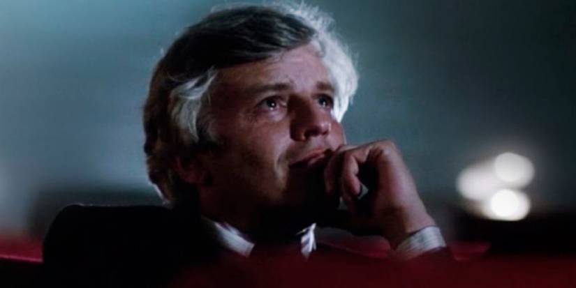A man at the movie theater in Cinema Paradiso