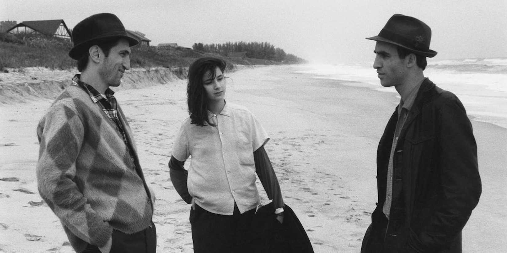 John Lurie as Willie, Eszter Balint as Eva, and Richard Edson as Eddie standing at the beach in Stranger Than Paradise