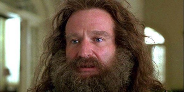 Robin Williams with a full beard stepping into civilization for the first time 
