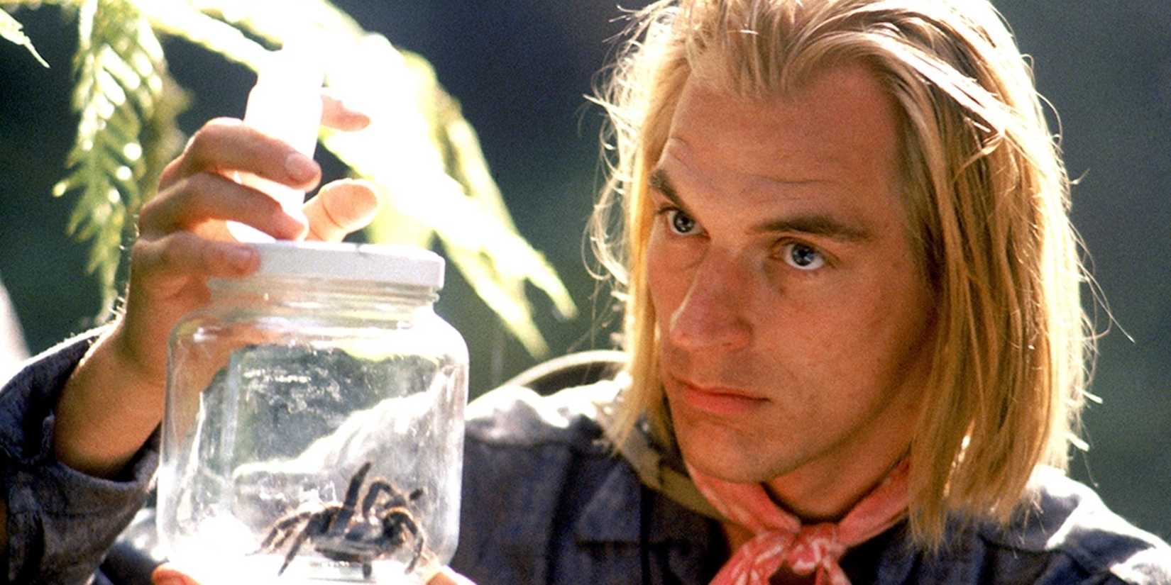 Julian Sands as Dr. James Atherton, holding a tarantula in a jar in Arachnophobia