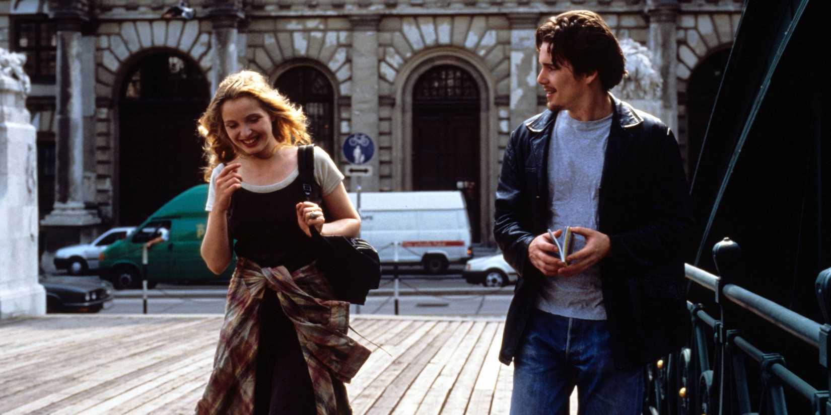 Ethan Hawke and Julie Delpy as Jesse and Céline in 'Before Sunrise' walk side by side in Vienna