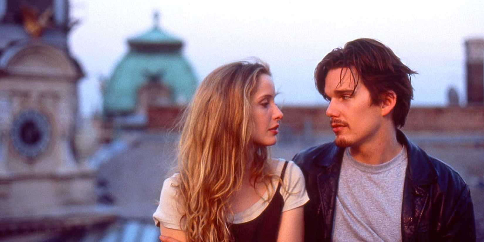 Celine and Jesse embracing and looking into each other's eyes in Before Sunrise.
