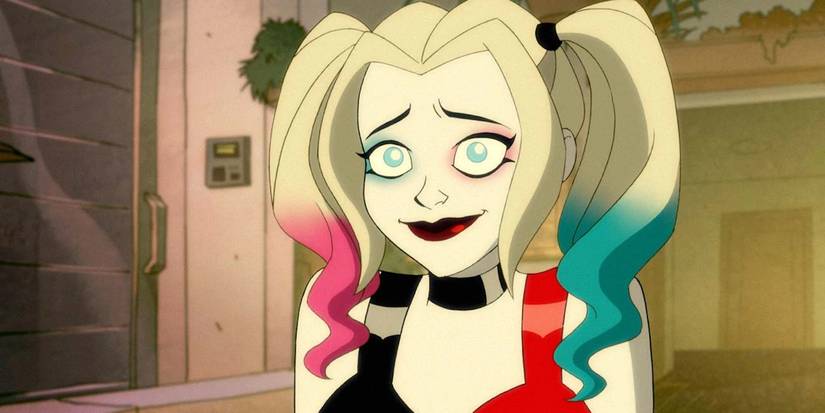 Harley Quinn smiling warily in the show Harley Quinn.