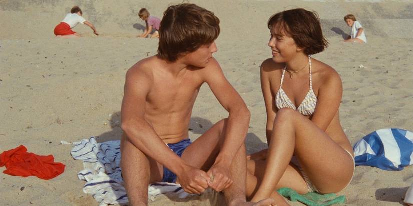 A boy and a girl at the beach in Pauline at the Beach