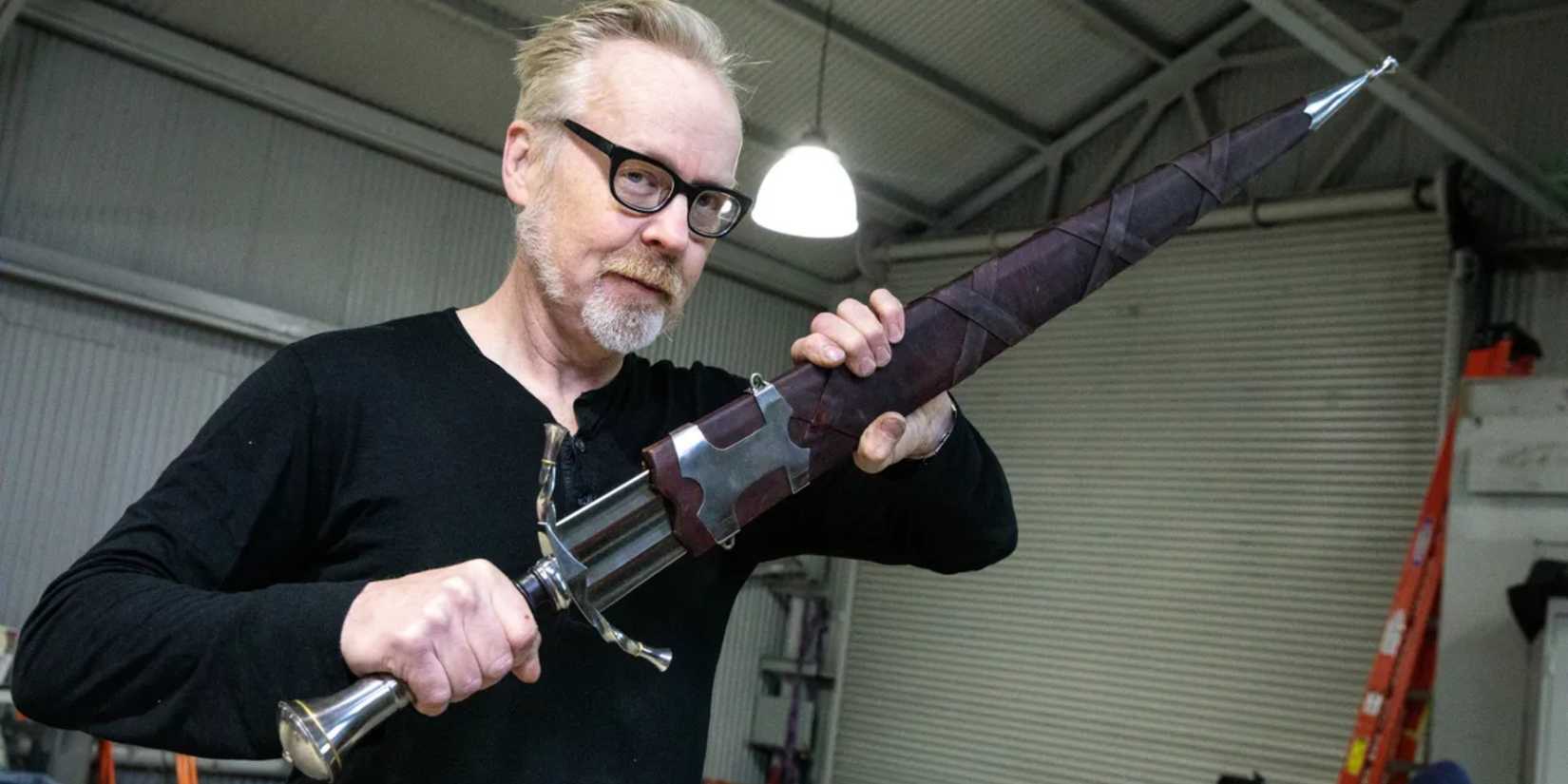 Adam Savage with a sword on his YouTube channel
