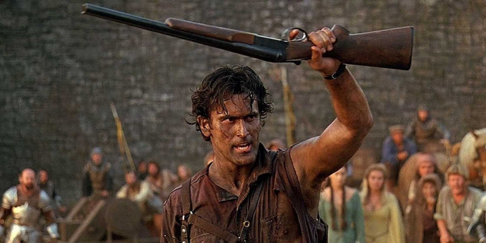 Ash holding a rifle up with a crowd of onlookers in Army of Darkness.