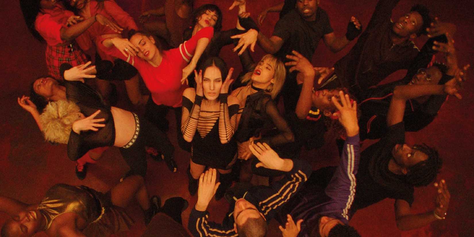 The cast of Gaspar Noé's dance-horror film, Climax (2018), during one of the film's most iconic dance scenes. 