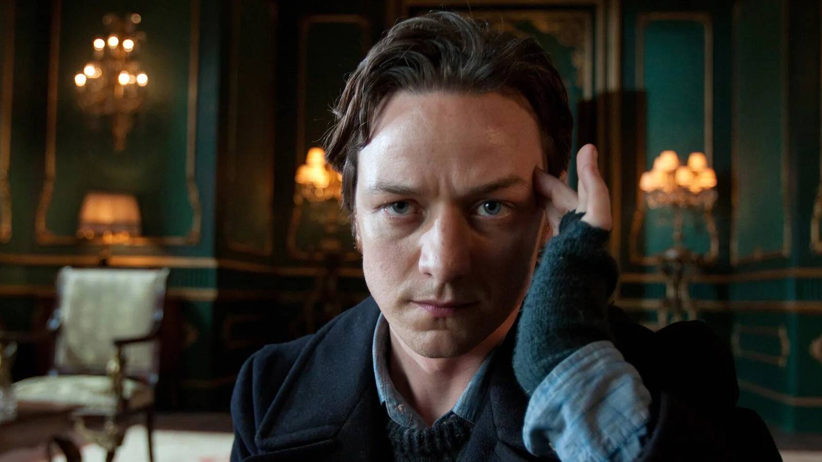 James McAvoy as Charles Xavier touching his head in X-Men: First Class