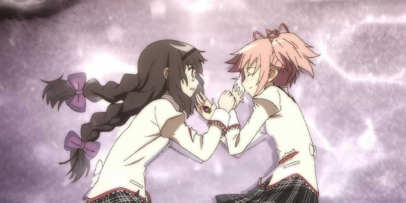 Homura and Madoka laying on the floor together in Madoka Magica.