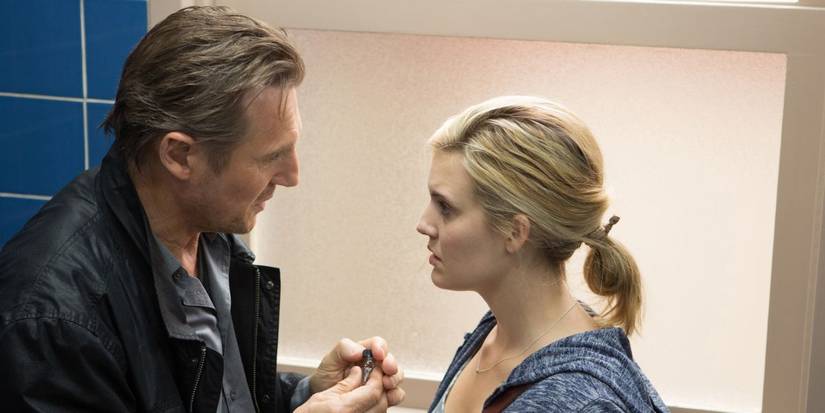 Liam Neeson and Maggie Grace talk in a bathroom in 'Taken 3.'