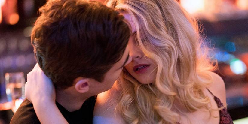 After We Fell with Hardin played by Hero Fiennes Tiffin and Tessa played by Josephine Langford holding each other 