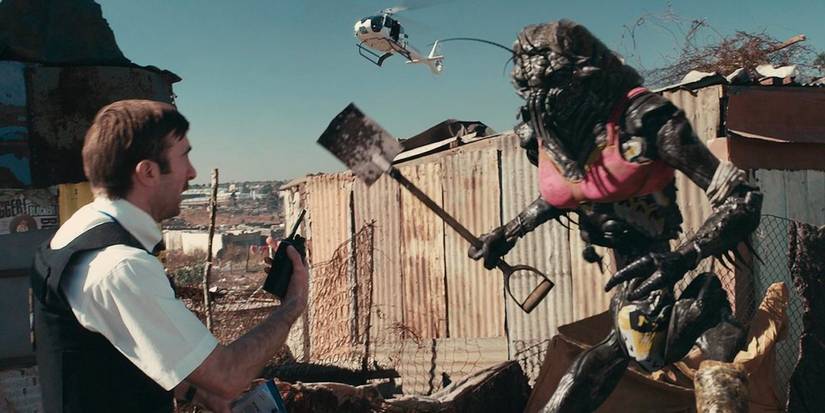 Wikus (Sharlto Copley) and a prawn in 'District 9'