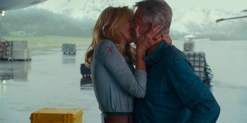 Laura Dern and Sam Neill share a kiss in Jurassic World Dominion