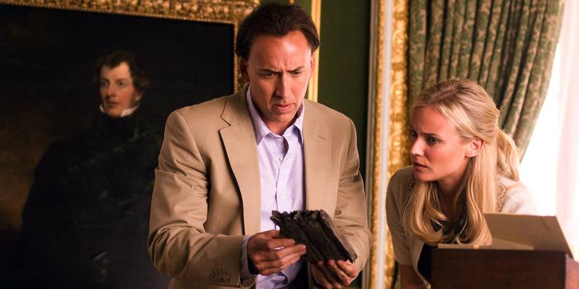 Ben Gates and Abigail Chase looking at an old artifact in 'National Treasure.'