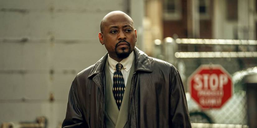 Omar Epps as Malcolm Howard on the street looking to the distance in Power Book III: Raising Kanan.