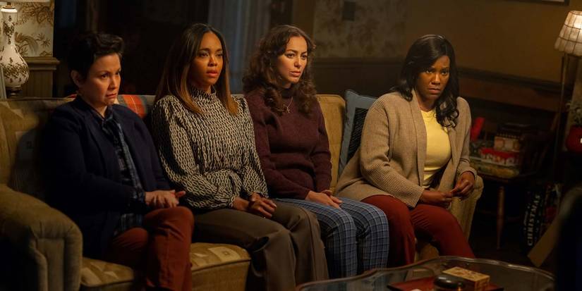 The cast sit on a couch with serious expressions in Pretty Little Liars: Original Sin.