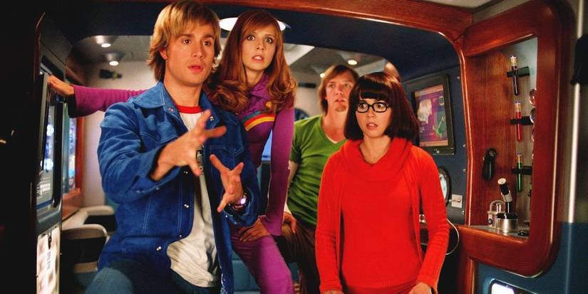 Fred (Freddie Prinze Jr.), Daphne (Sarah Michelle Gellar), Shaggy (Matthew Lillard), and Velma (Linda Cardellini) look for clues in 'Scooby Doo 2: Monsters Unleashed'