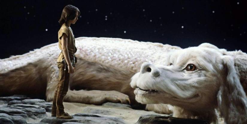 A boy looks at a strange creature in The NeverEnding Story