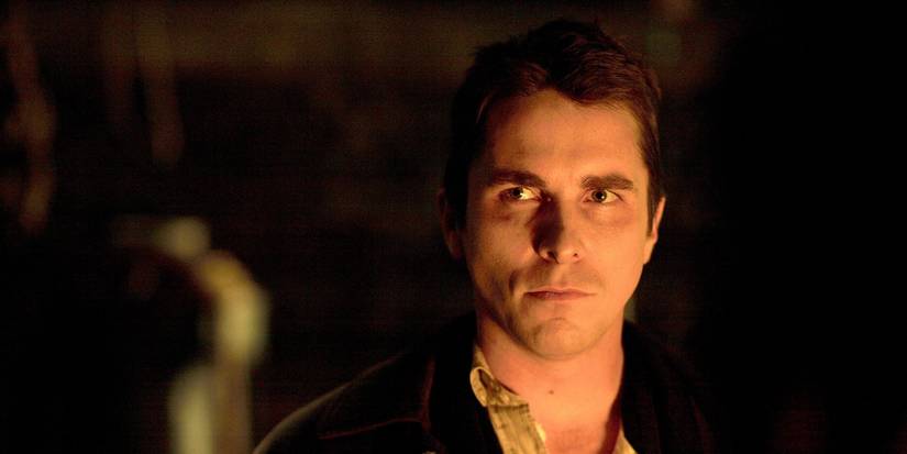 Christian Bale as Alfred Borden looking at a person offscreen in The Prestige