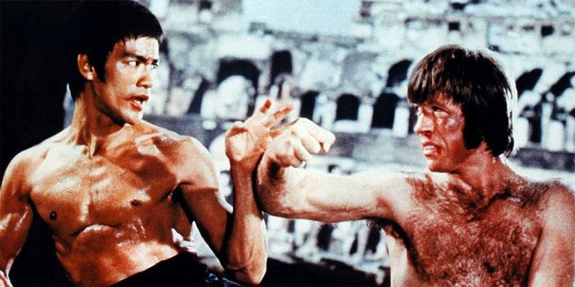 Shirtless Bruce Lee and Chuck Norris fighting in The Way of the Dragon