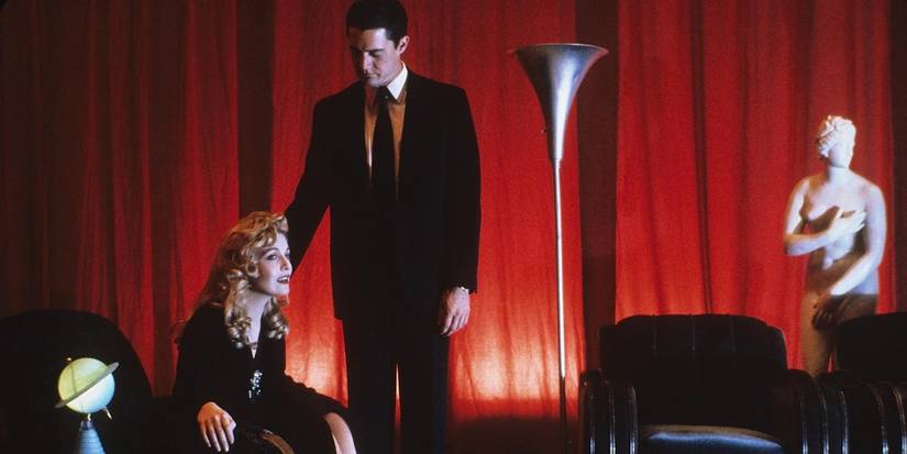 Dale Cooper approaching Laura Palmer while in a red room in Twin Peaks: Fire Walk with Me.