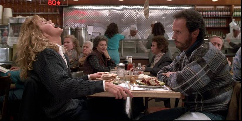 Meg Ryan as Sally and Billy Crystal as Harry having a meal in a diner in When Harry Met Sally