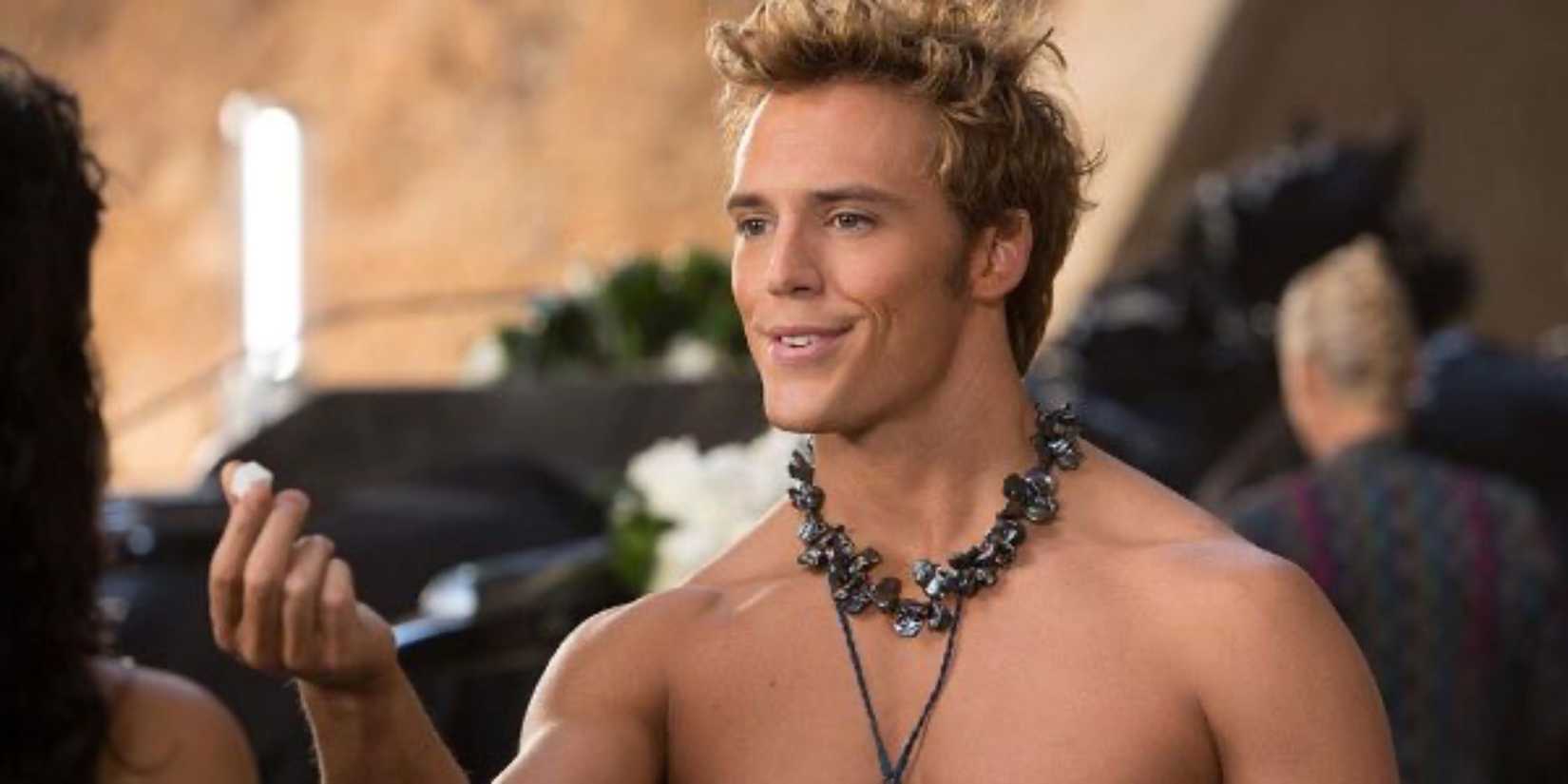 Finnick (Sam Claflin) holds out a sugar cube in 'The Hunger Games: Catching Fire'