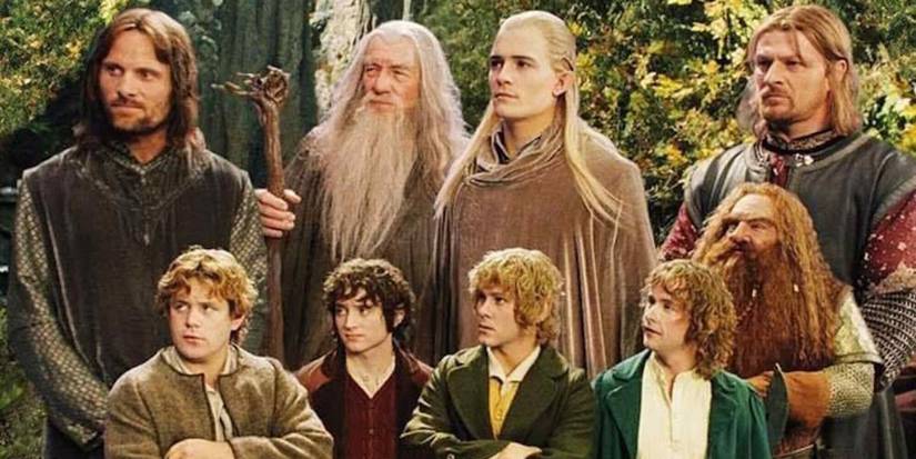 The Fellowship of the Ring huddled together