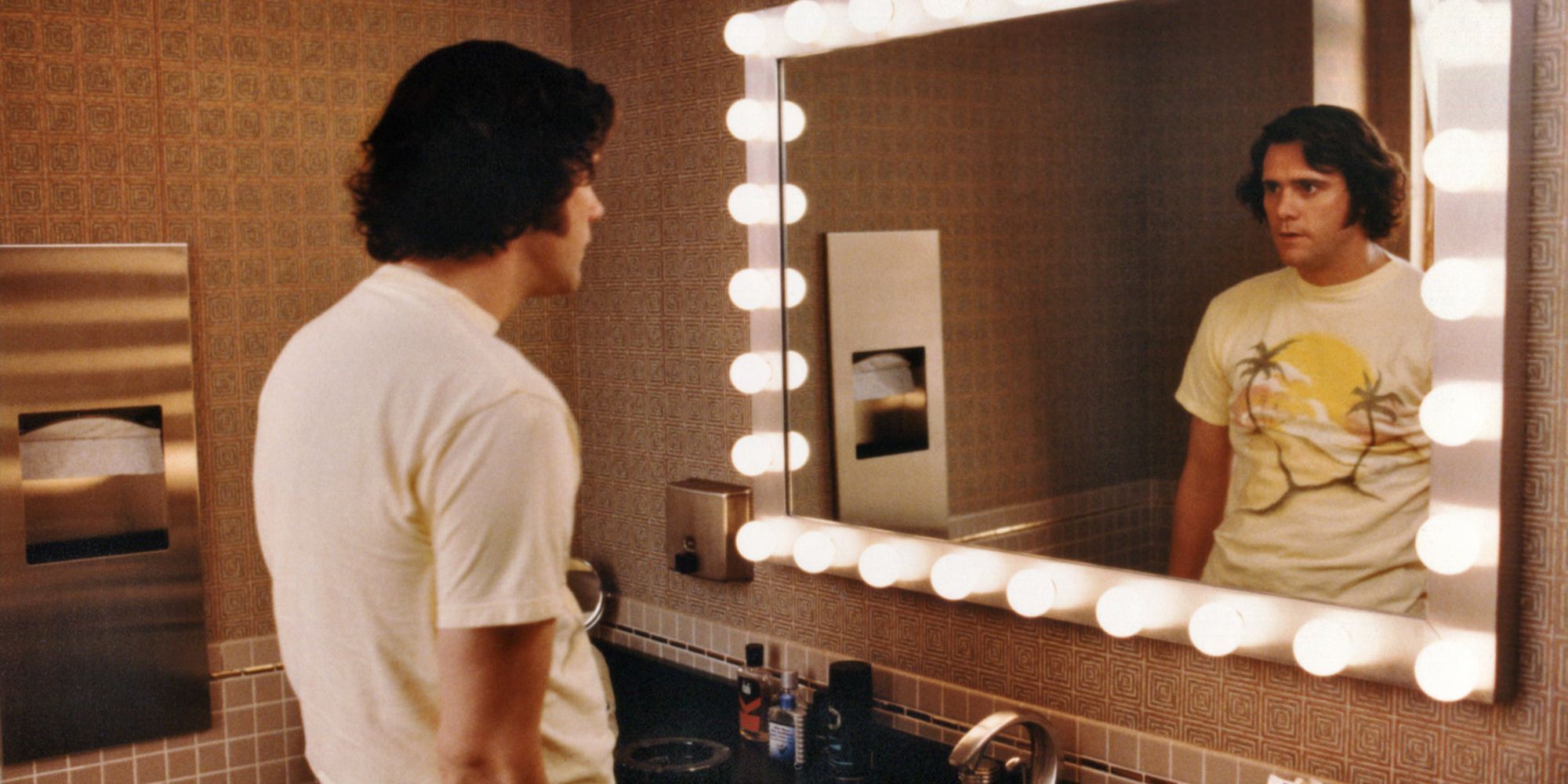 Jim Carey as Andy Kauffman, starring at his reflection in the mirror