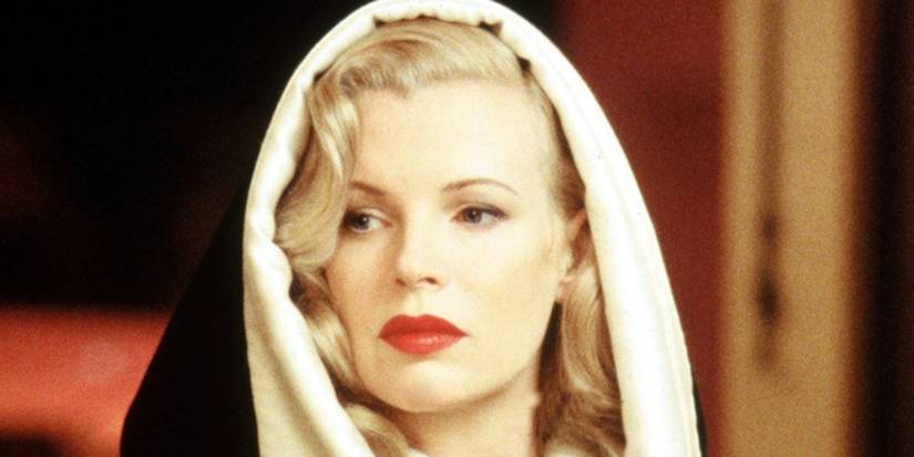 Kim Basinger as Lynn Bracket looking stoic in L.A. Confidential.