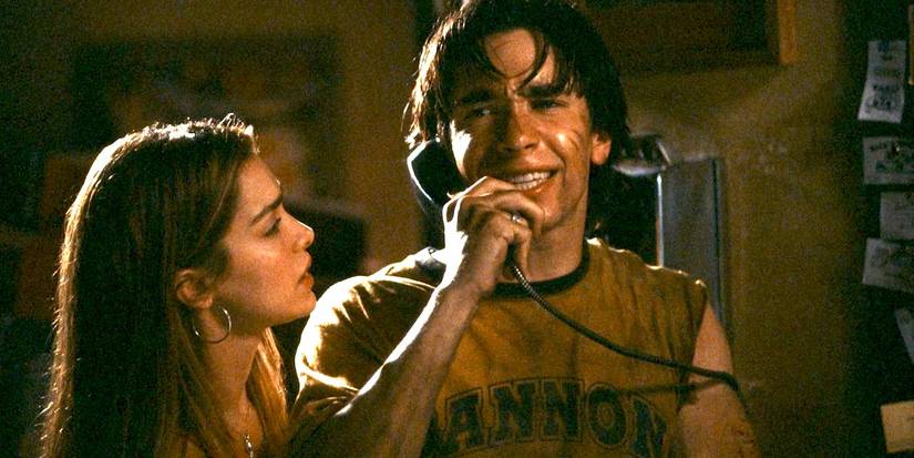 Trish looks as a crying Danny talks on the phone in Jeepers Creepers.