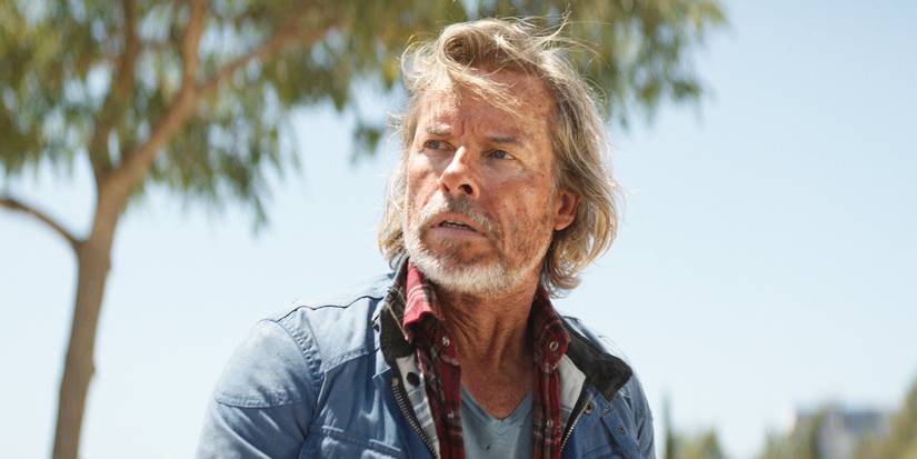 Guy Pearce outside looking worried in The Infernal Machine