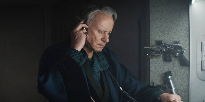 Luthen aka Axis using a listening device in Andor.