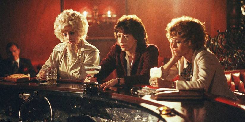 Dolly Parton Lily Tomlin and Jane Fonda at a bar in 9 to 5
