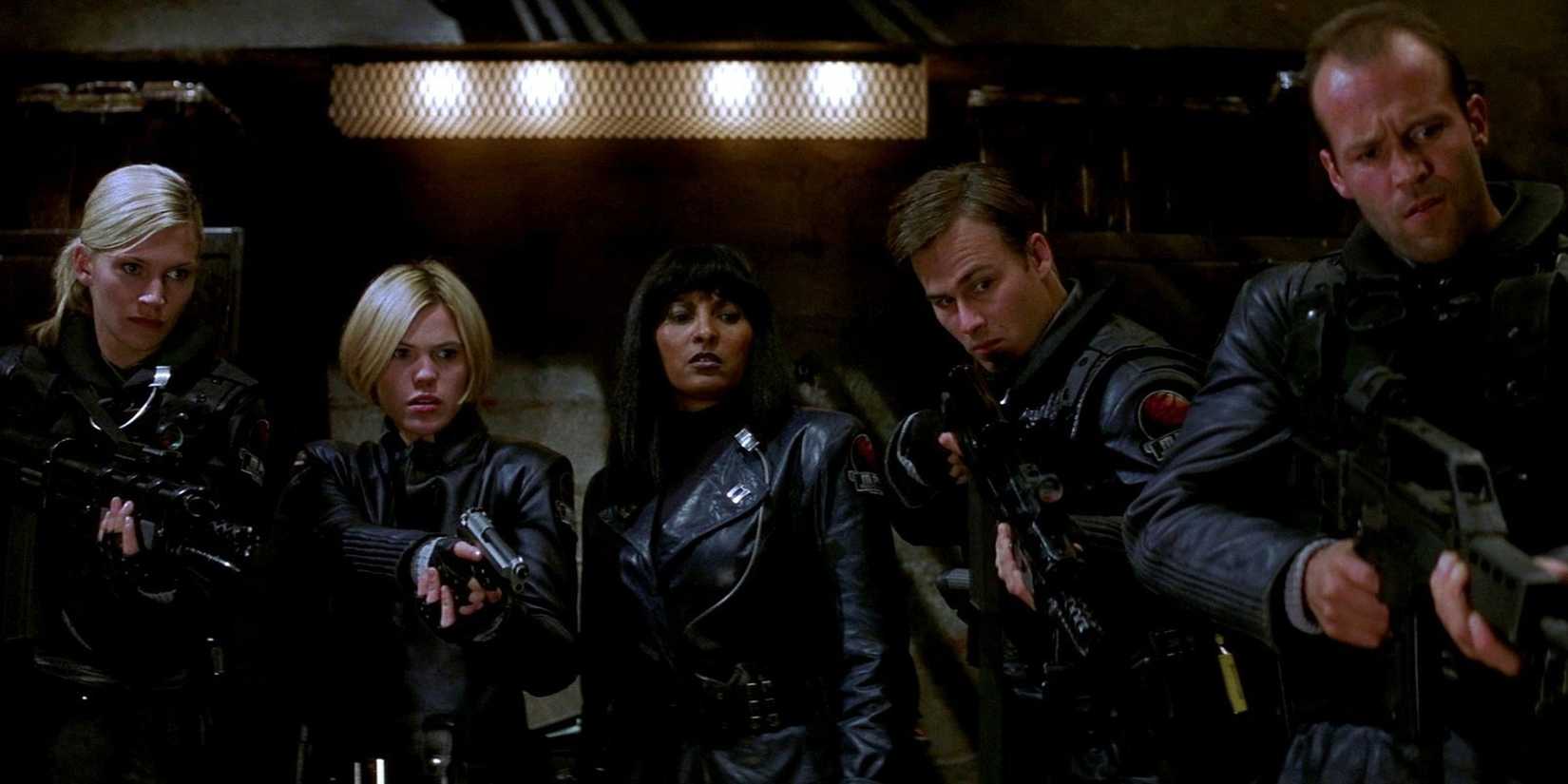 A group of soldiers aiming their guns in Ghosts of Mars