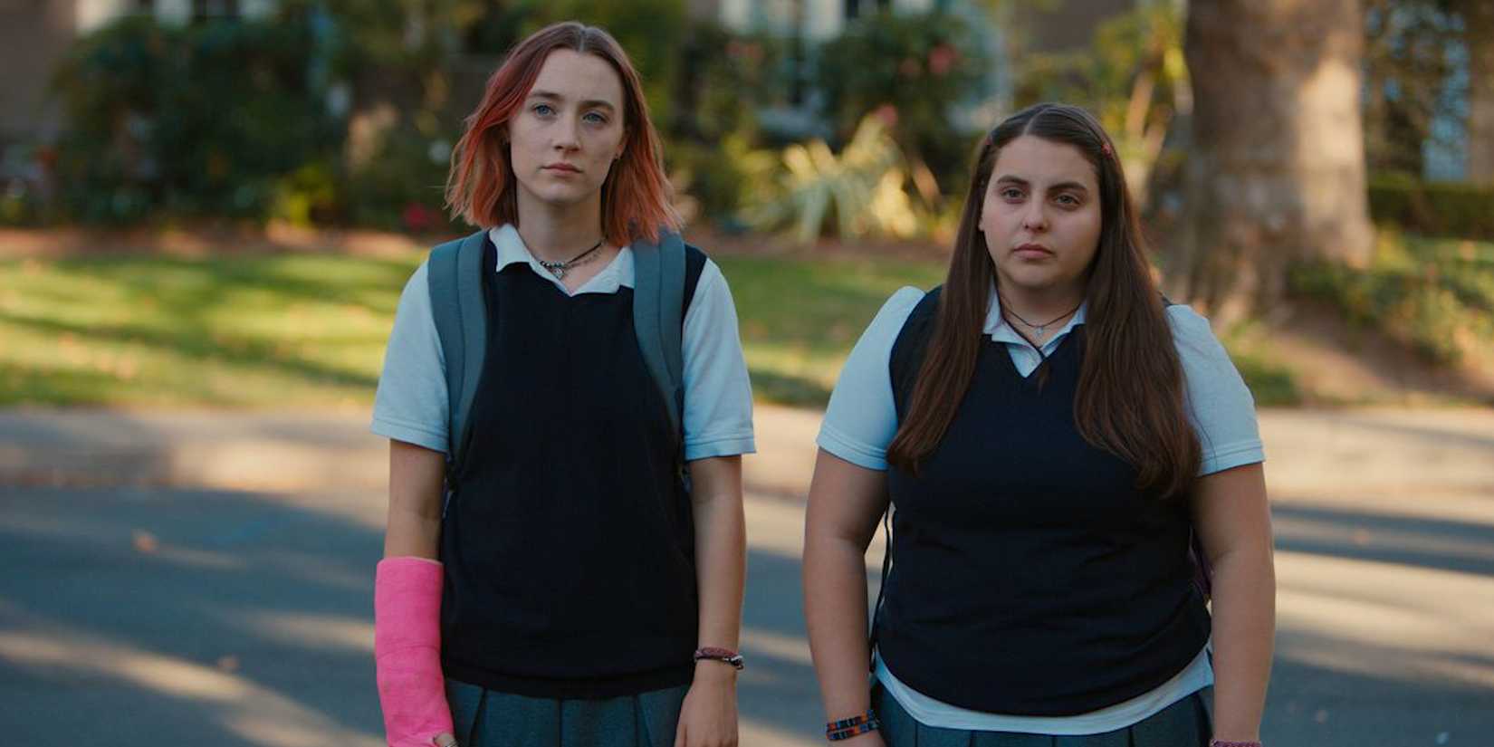 Christine "Lady Bird" McPherson and Julianne Steffans in Lady Bird, looking disinterestedly at something offscreen