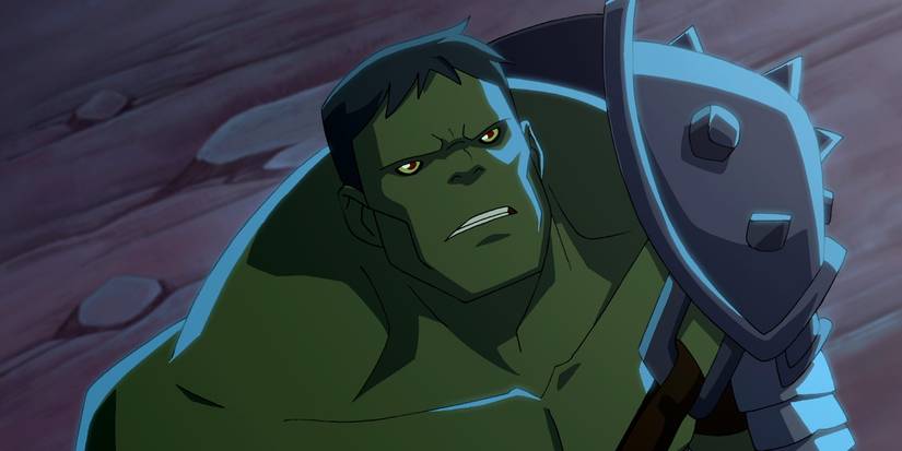 Hulk with armor on his arm looking up to the sky in Planet Hulk.