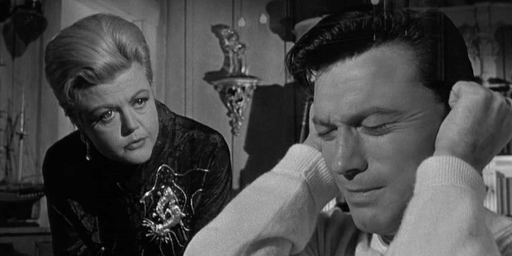 Mrs. Iselin talking to a distressed Raymond, who's covering his ears, in The Manchurian Candidate - 1962