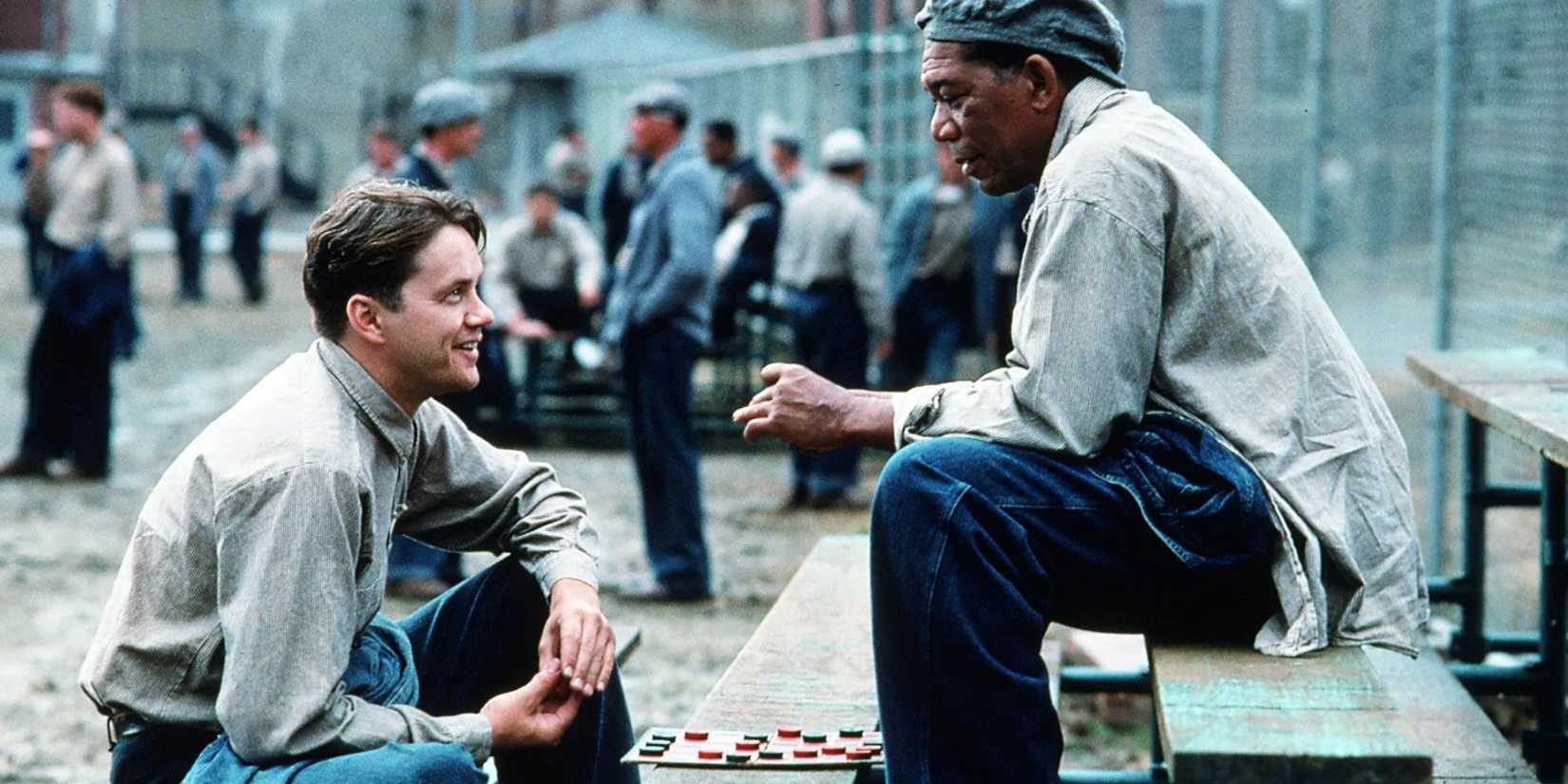 Andy kneels and plays checkers with Red in the Shawshank Redemption.