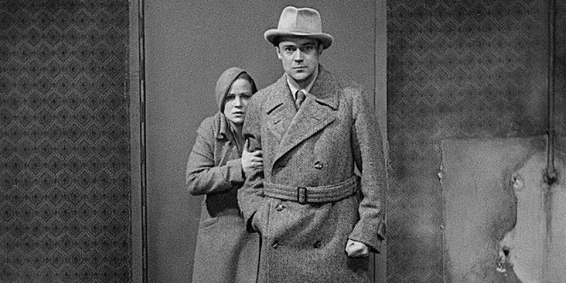 Monique Rolland clutching Gustav Diessl's arm in The Testament of Dr. Mabuse - 1933