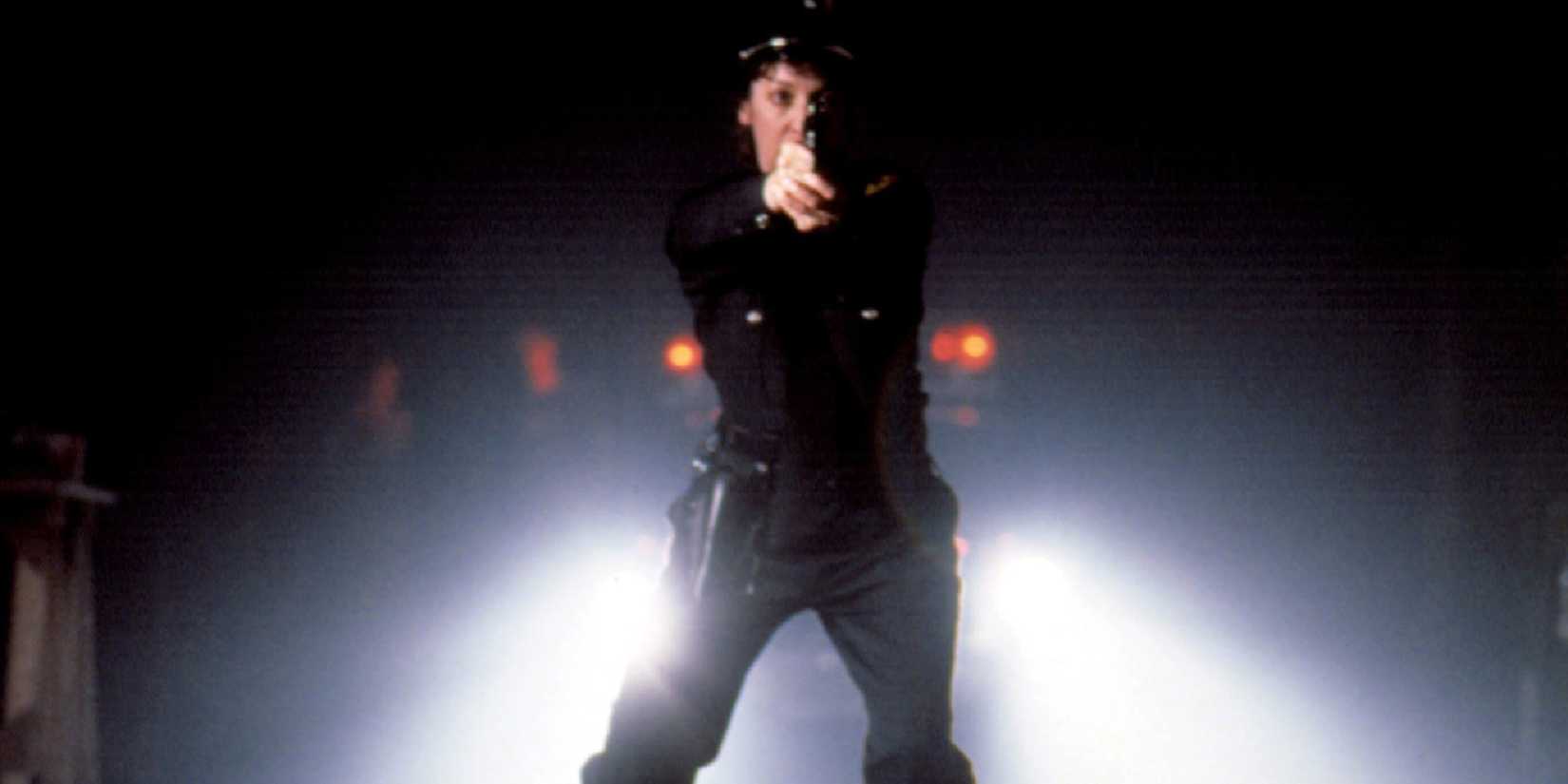 A cop with a gun in The Thin Blue Line - 1988