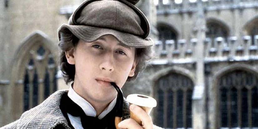 Nicholas Rowe smoking a pipe in Young Sherlock Holmes