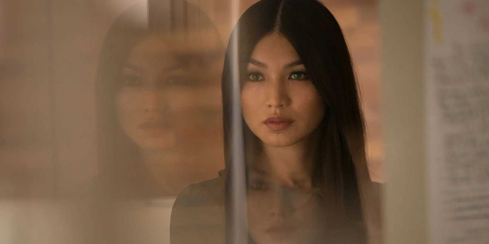 Gemma Chan in front of a glass in 'Humans'.