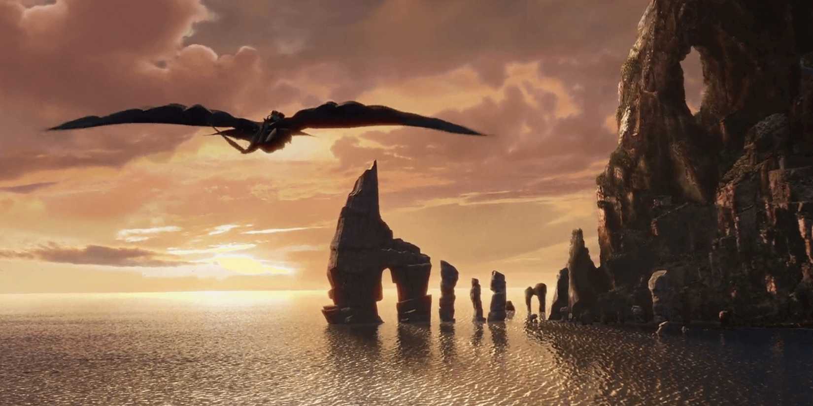 Hiccup riding Toothless the dragon in front of a sunset by cliffs in 'How To Train Your Dragon'. 