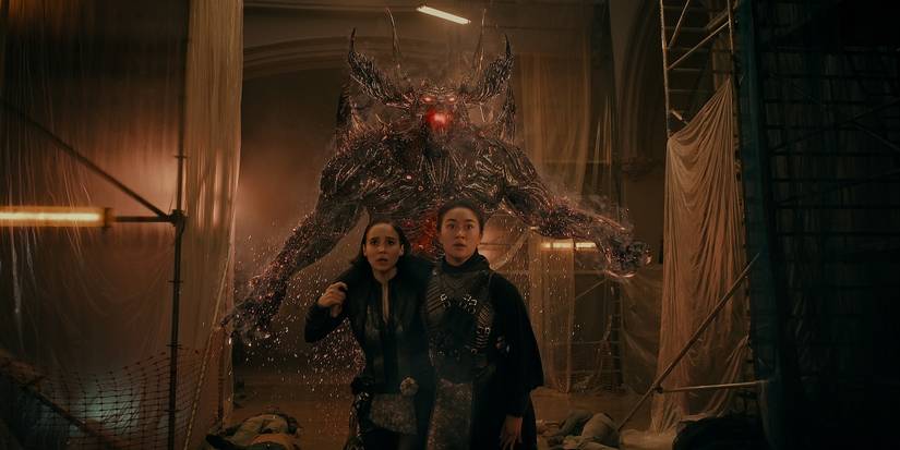 Two of Warrior Nun's main characters escaping a Demon while looking forward in worry.