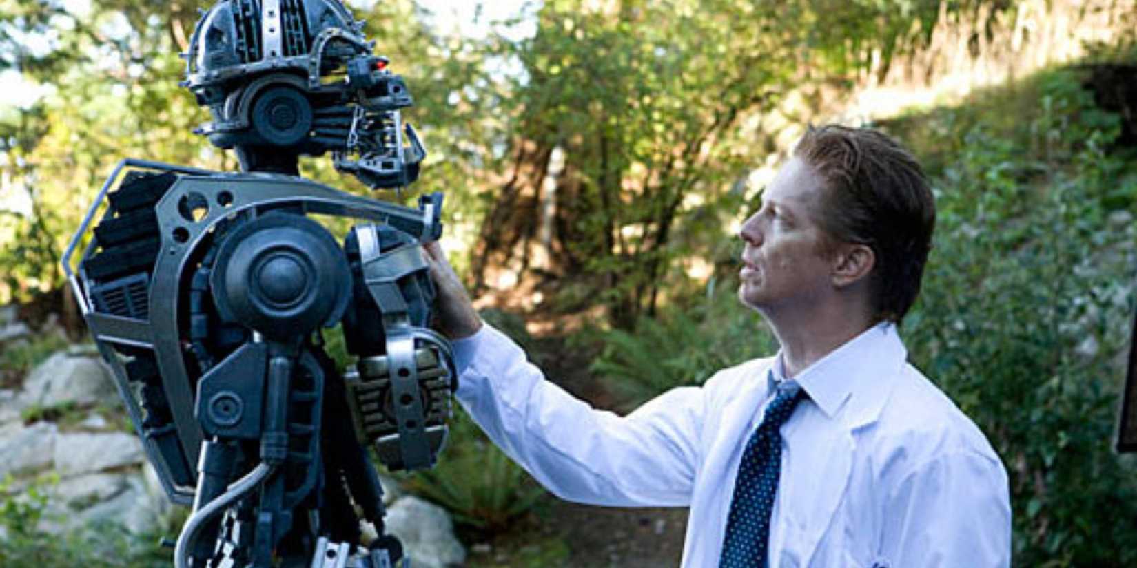 Daniel Graystone (Eric Stoltz) with a prototype Cylon in 'Caprica.'