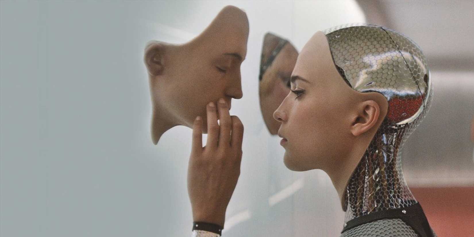 Alicia Vikander as Ava looking at humans masks in 'Ex Machina'