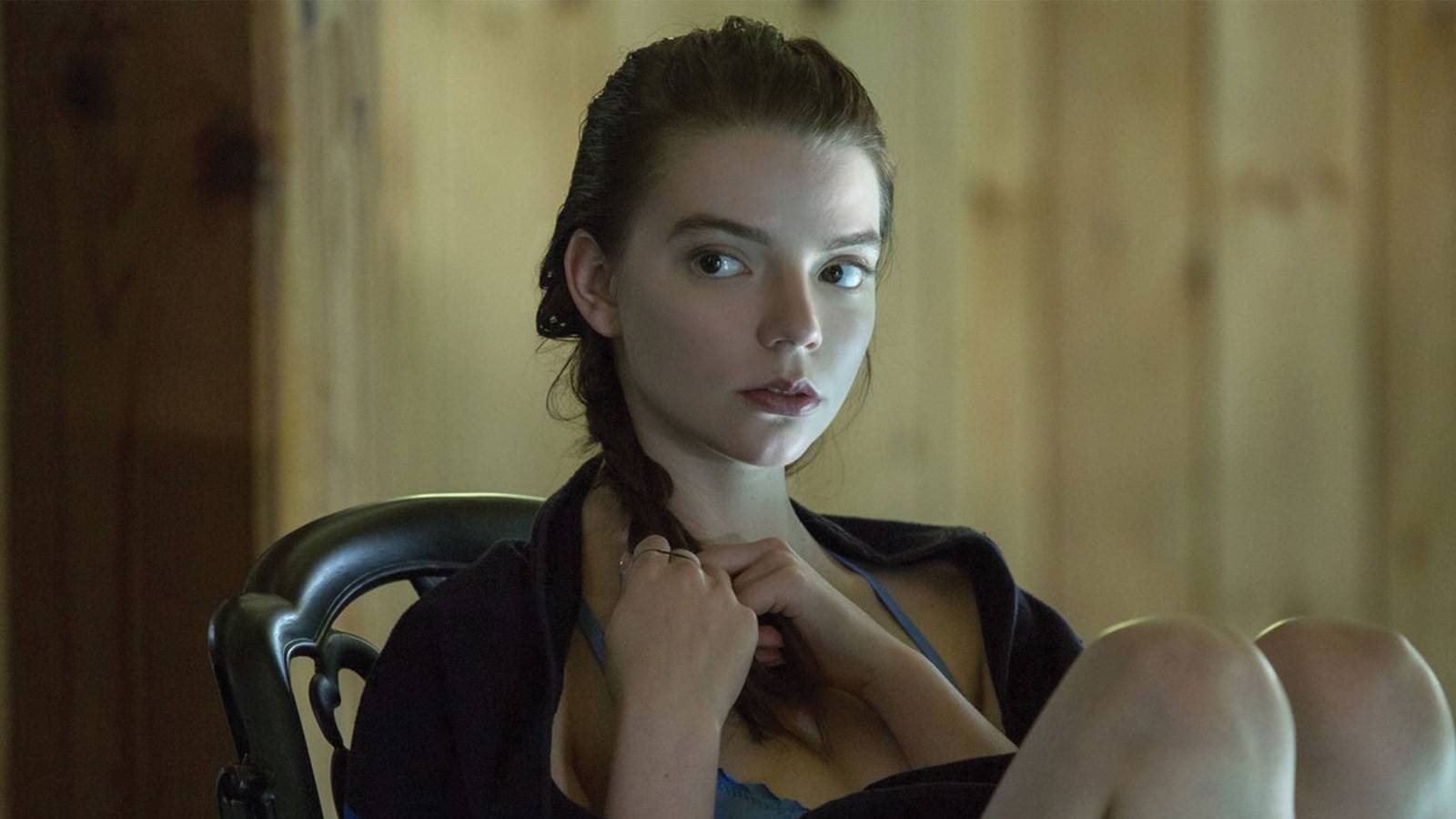 Anya Taylor-Joy as Lily sitting wrapped in a towel in the film Thoroughbreds.